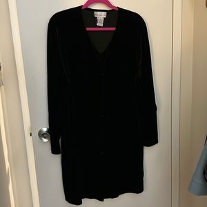 Black velvet dress with 6 round velvet buttons down the front.